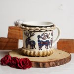 Handcrafted Ceramic Mug with Rucervus Prints & Shell Accents