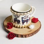 Handcrafted Ceramic Mug with Rucervus Prints & Shell Accents