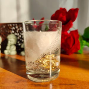 Luxurious scented candle with golden pearl design, eco-friendly and handcrafted for meditation, relaxation, and festive decorations