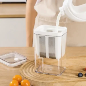 Hands holding yogurt filter basket above transparent BPA-free container